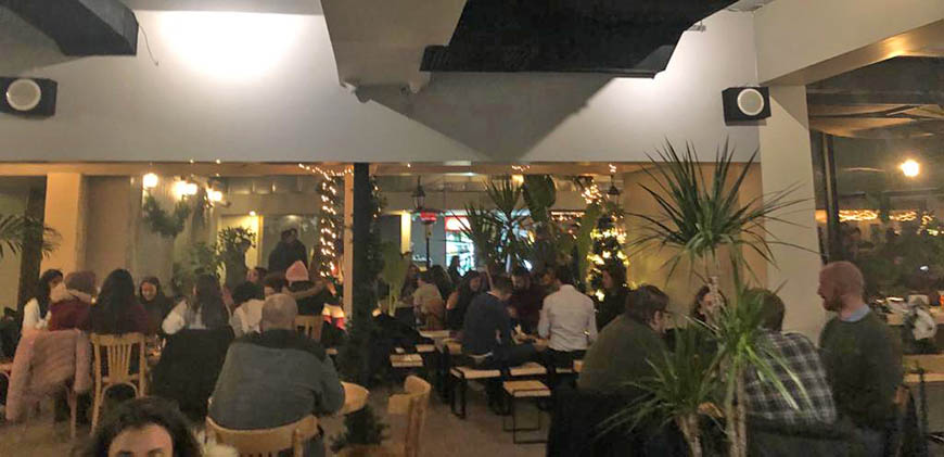 Customers gather in a coffee house in Jabal Luweibdeh in this photo taken in December, 2019 (Photo courtesy of Sean Mathews)